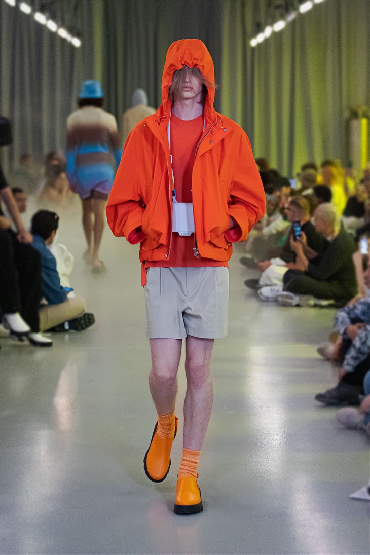 Jackson Wang Slips on Orange Sneakers at Louis Vuitton's PFW Show