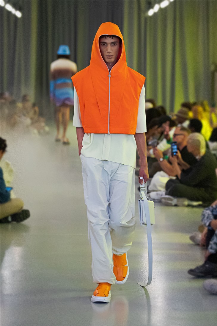 Jackson Wang Slips on Orange Sneakers at Louis Vuitton's PFW Show